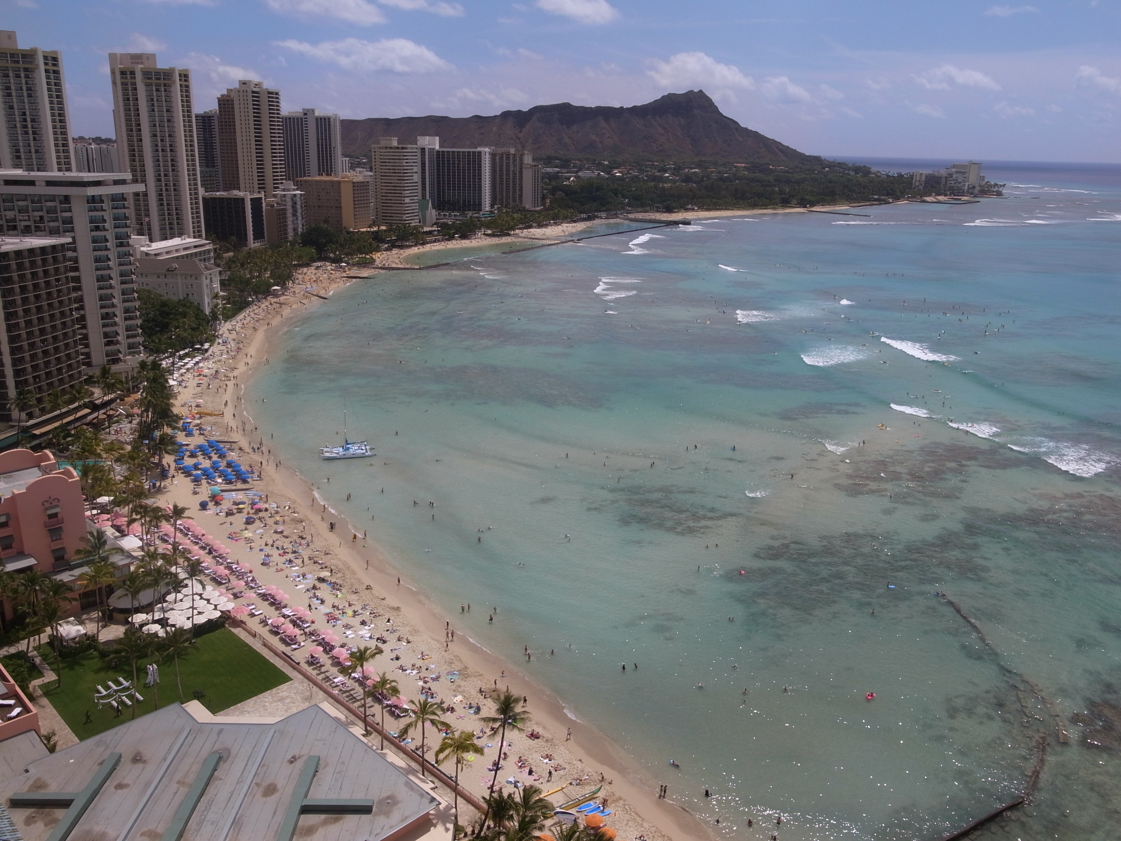 Waikiki Beach, turquoise ocean and Diamond Head in the distance